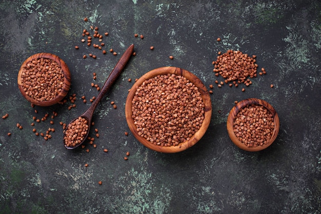 Buckwheat groats in wooden bowl