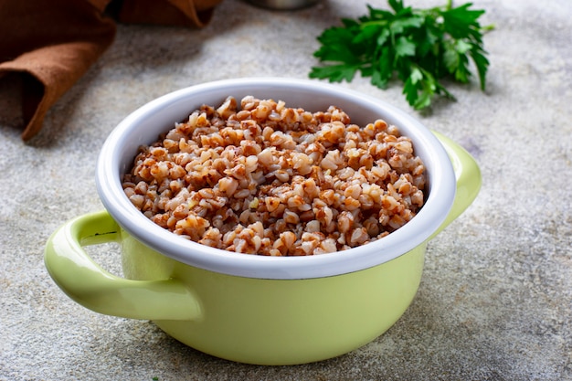 Buckwheat porridge in green pot