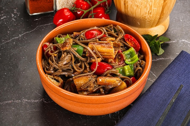 Photo buckwheat soba with eel and vegetavles
