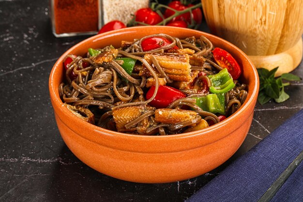 Photo buckwheat soba with eel and vegetavles