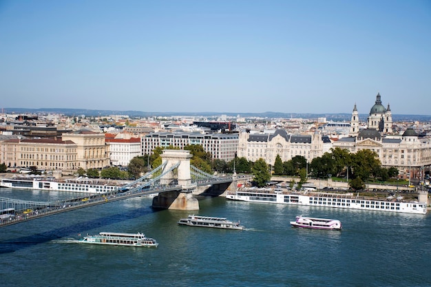 BUDAPEST HUNGARY SEPTEMBER 23 View landscape and cityscape and Hungarian Parliament with tour cruises in Danube Delta river and Budapest Chain Bridge on September 23 2019 in Budapest Hungary