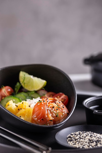 Buddha bowl, poke with salmon for dinner