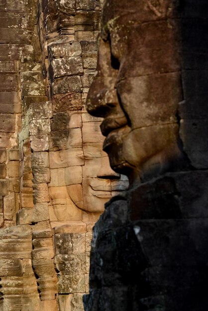 Buddha heads carved on bayon temple