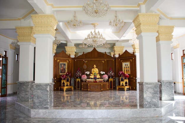 Buddha statue and monk statues for thai people travelers travel visit respect praying blessing with worship holy wish at Wat Raikhing or Rai Khing temple on November 42022 in Nakhon Pathom Thailand