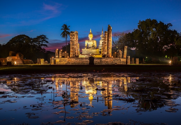 Buddha Statue at Wat Mahathat, buddha temple, in Sukhothai Historical Park, Thailand