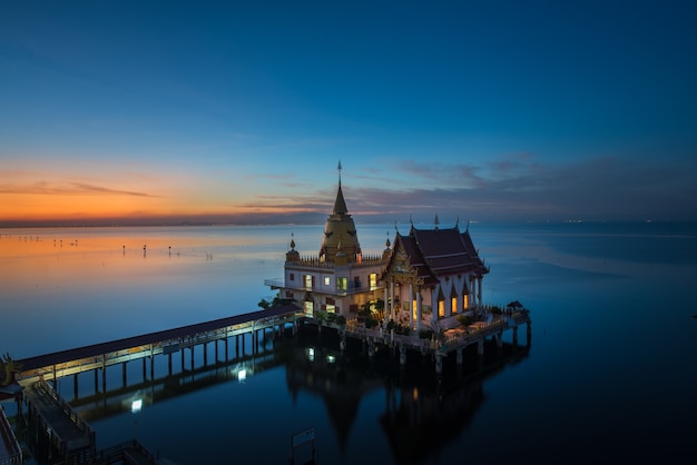 Buddhist church and pagoda in the sea Wat Hong Thong Golden swanlake temple Chachoengsao