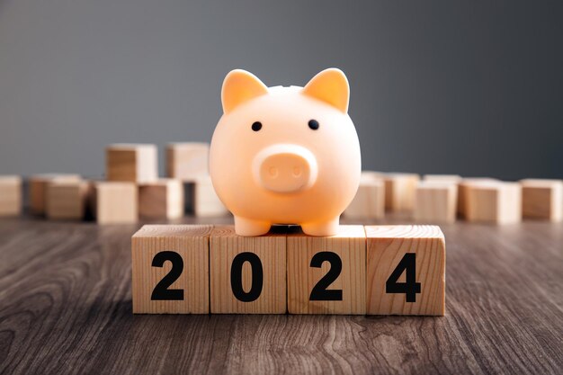 Budget Plan 2024 Piggy Bank on top of wooden block