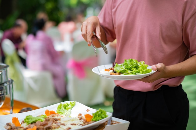 Buffet food catering food party at restaurant mini canapes snacks and appetizers