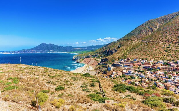 Buggerru city and beach in south sardinia of italy