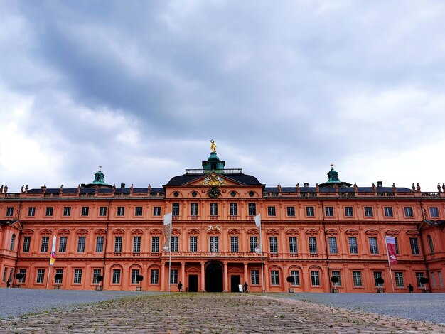 Building against cloudy sky