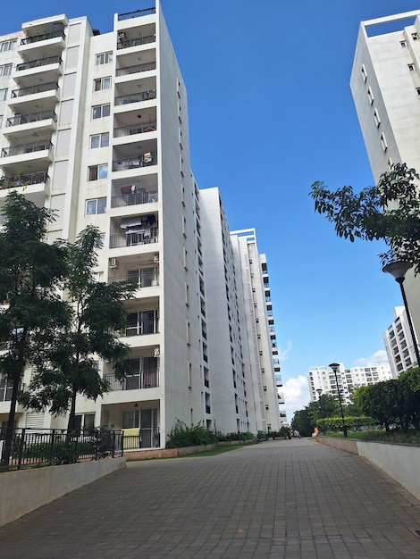 the building in the background is a building with a tree on the right.