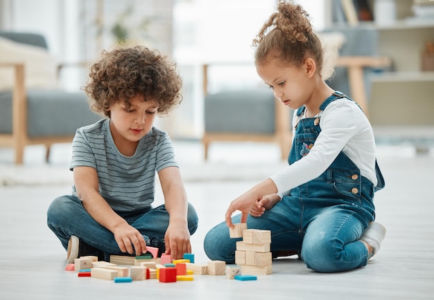 building blocks learning and children on living room floor for school creative and geometric solution playroom education and montessori puzzle with kids in family home for youth and toys