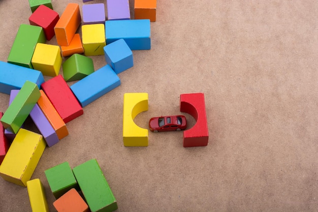 Photo building blocks and a red toy car