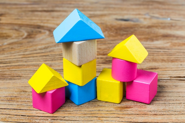 Building blocks on wooden background，Colorful wooden building blocks