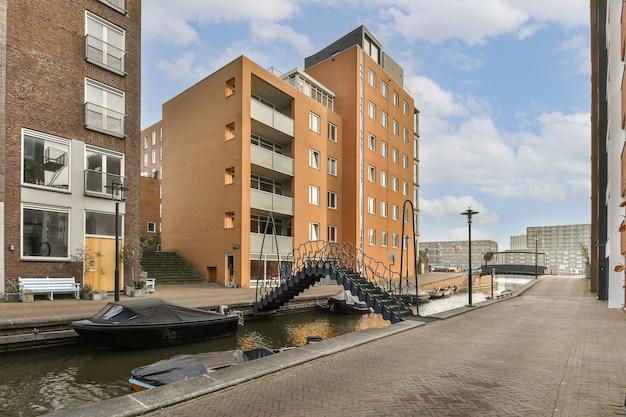 A building on a canal with a boat in it