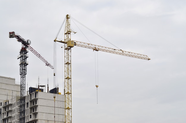 Building under construction with crane