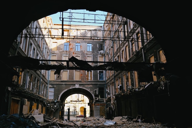 A building under construction with a large arch in the center.