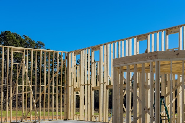 Building construction wood framing beams of a new house under construction