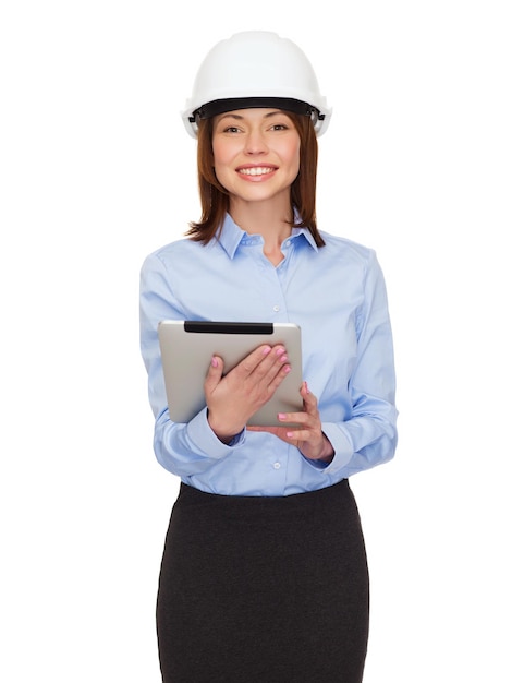 building, developing, consrtuction and architecture concept - friendly young smiling businesswoman in white helmet