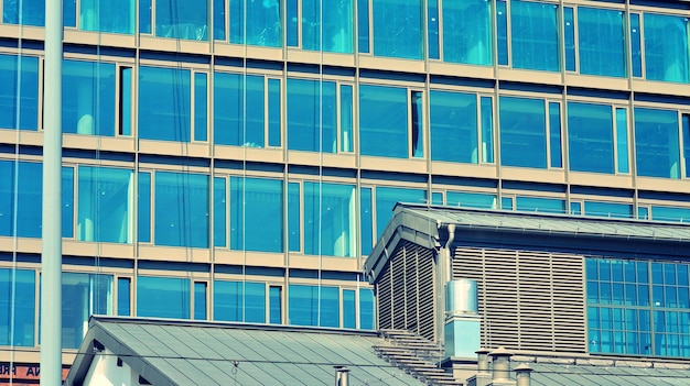 The building is made of glass and is made of blue glass