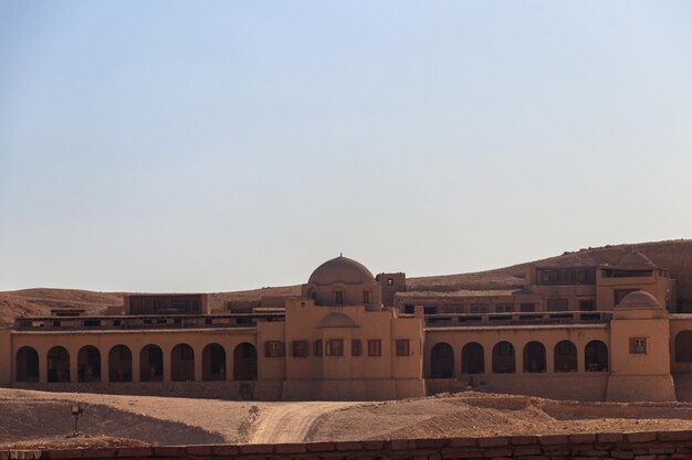 Building near the temple of Hatshepsut in Deir el-Bahri on the West Bank of the Nile near Luxor (ancient Thebes) in Egypt