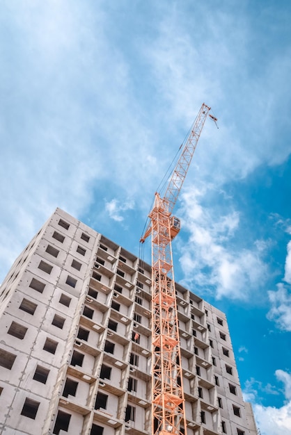 Building of new apartments and crane