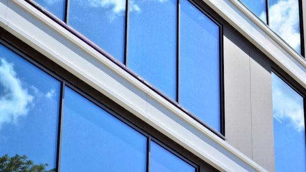 a building with a blue glass window that says " sky ".