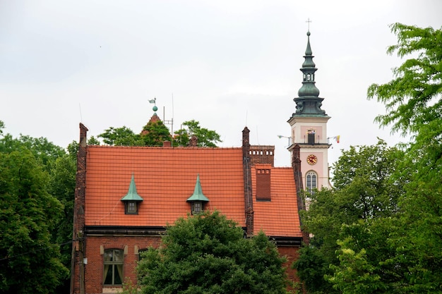 A building with a church in the background