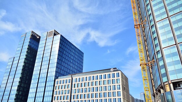 a building with a large yellow crane on it