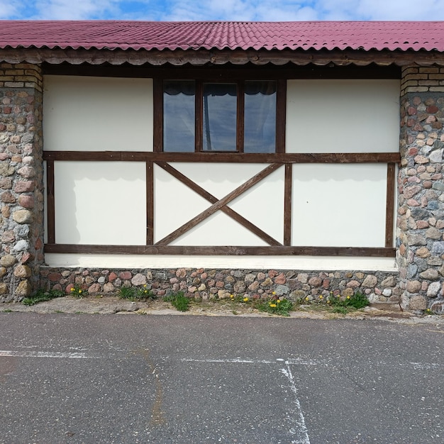 A building with a red roof and a red roof.