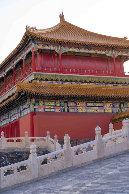 A building with a red roof and a yellow roof.