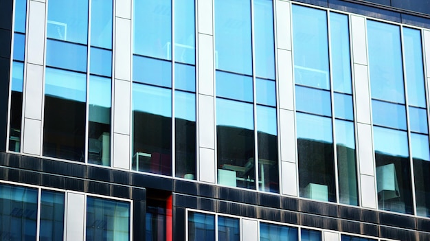 a building with a red window in the middle