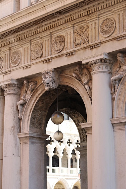 A building with a statue on the left side