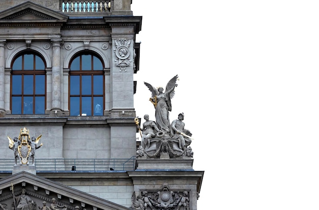 A building with a statue on the top of it