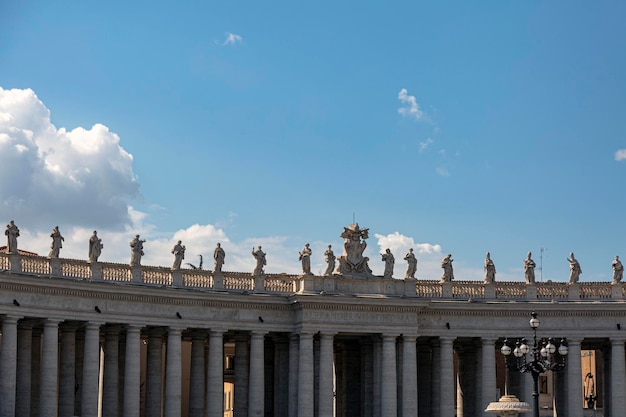 A building with statues on the top of it