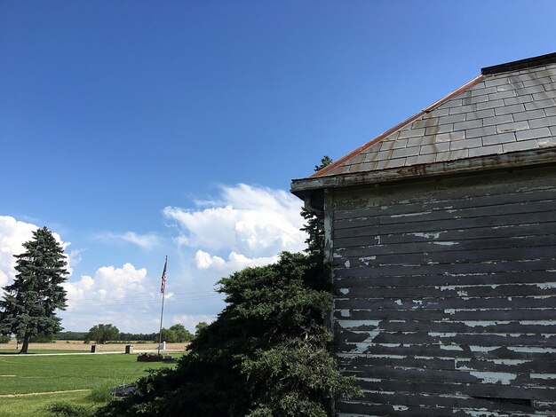 Buildings against blue sky and clouds