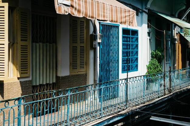 Photo buildings against blue sky in ho chi minh city