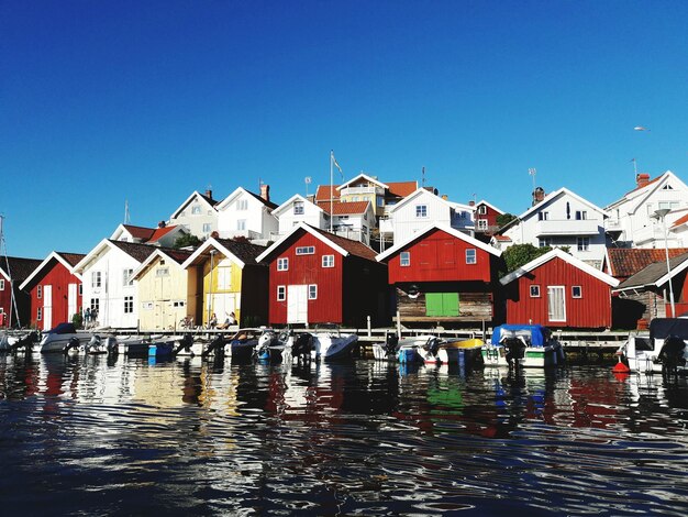 Photo buildings against clear blue sky