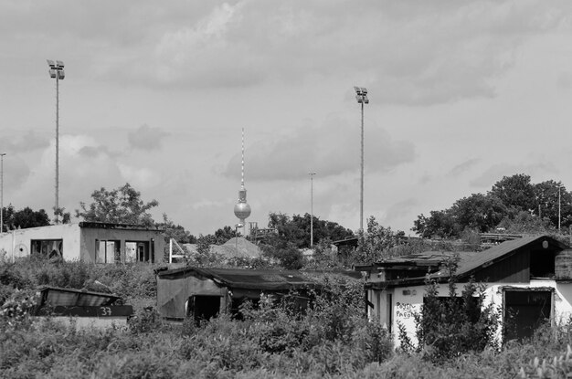 Buildings against cloudy sky