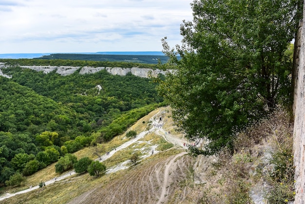 Buildings buildings and caves of the city of ChufutKale a medieval cave settlement in the Crimea Cave city Crimea