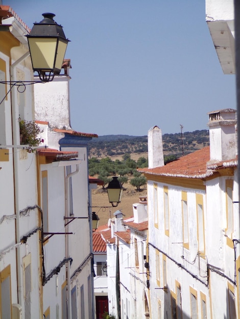 Photo buildings in city against clear sky