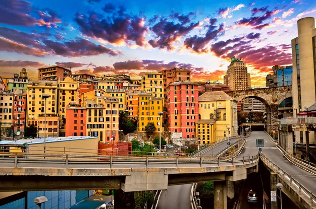 Photo buildings in city against sky during sunset