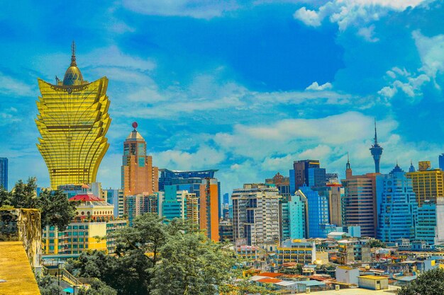 Buildings in city against sky