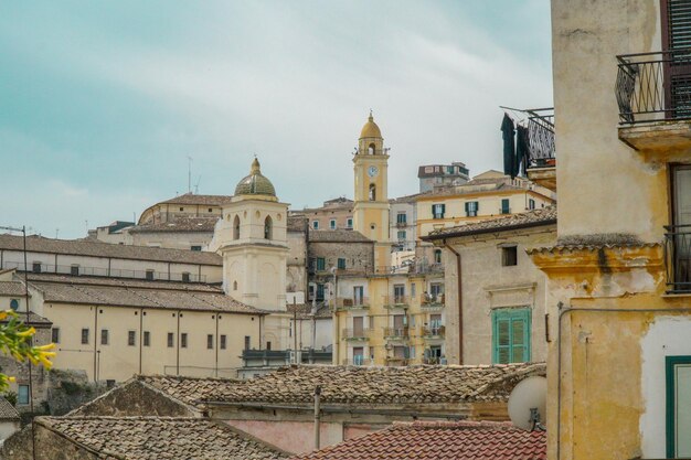 Buildings in city against sky