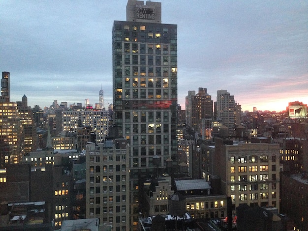 Buildings in city against sky