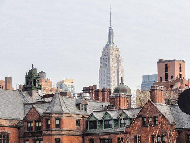 Buildings in city against sky