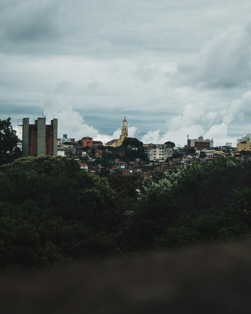 Buildings in city against sky