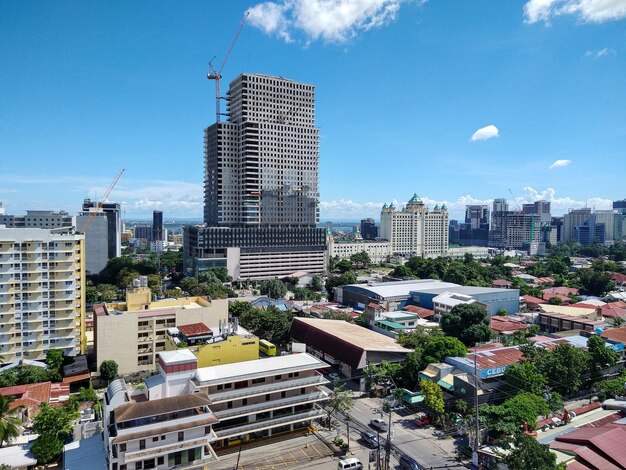 Buildings in city against sky