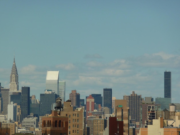 Photo buildings in city against sky