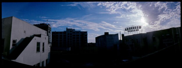 Photo buildings in city against sky